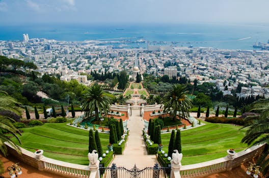 Stunning aerial view of Bahá'í Gardens and Haifa cityscape, a prominent tourist landmark in Israel.